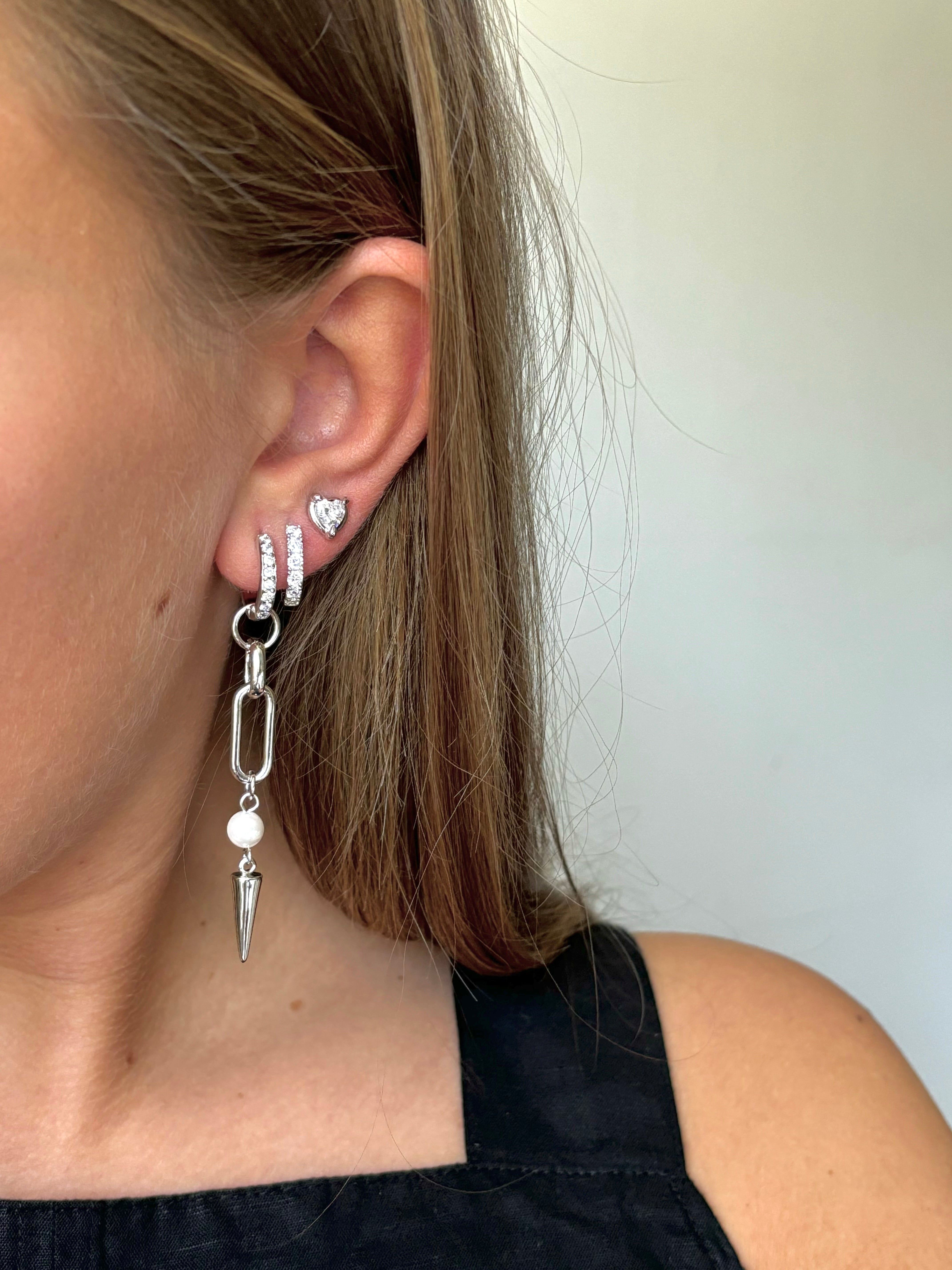 Adora Earrings in silver styled with stacked hoop and heart stud