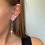 Adora Earrings in silver styled with stacked hoop and heart stud